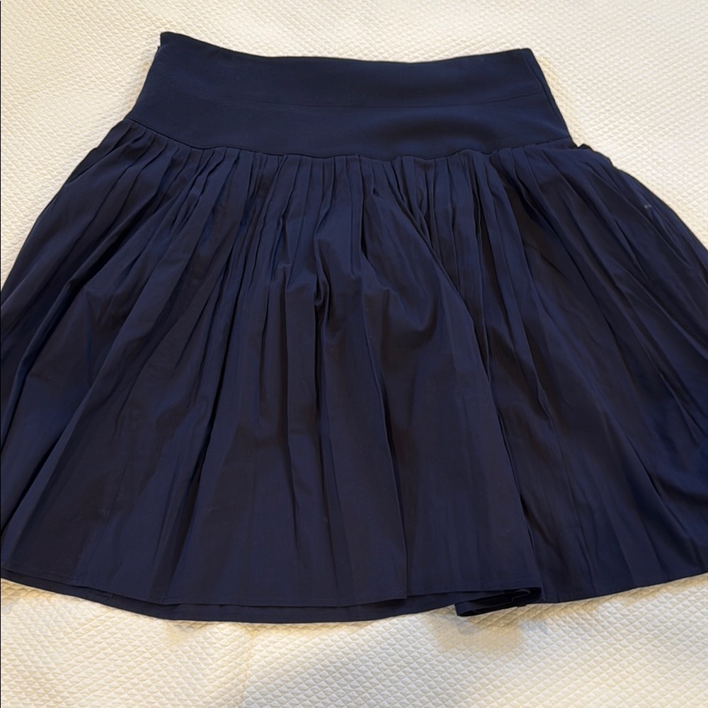 GILI. Navy drop waist pleated skirt. Ponte waist, cotton skirt. Size 12.